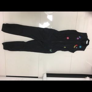 Black romper/bodysuit with fashion stickers